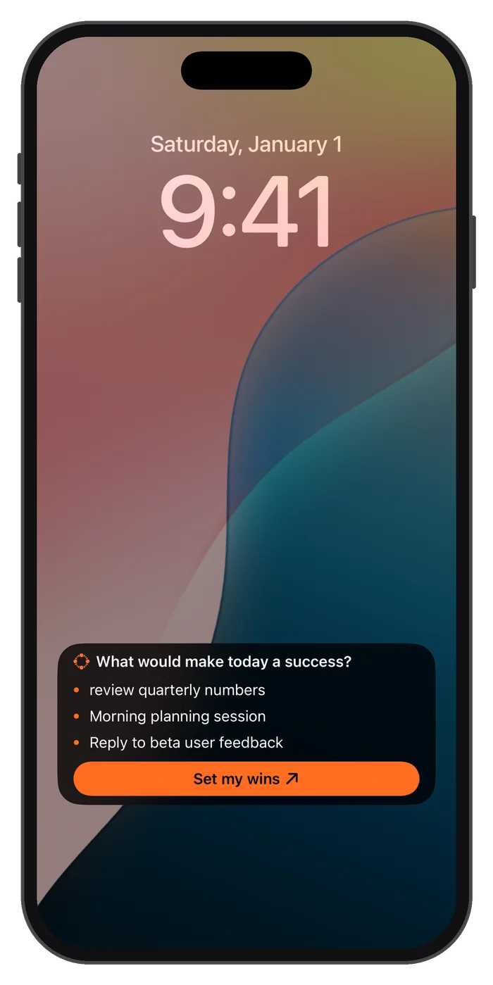 The lock screen Live Activity asking what would make today a success, with Set my wins